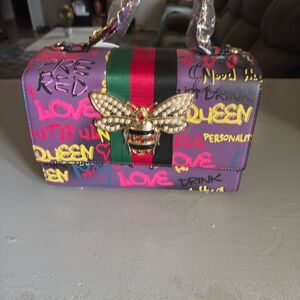 Purple Graffiti Bee Accent Shoulder Bag with Green-Red Stripe